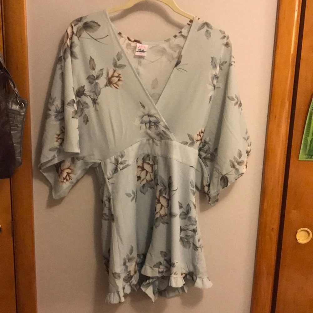 Size medium. light blue floral Romper.